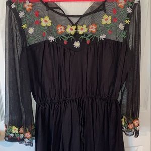 Black silk romper. Size large. Never worn.